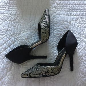 Black and gold pumps